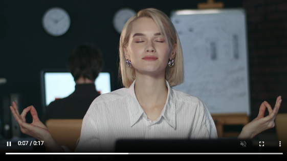 Business woman meditating in yoga pose